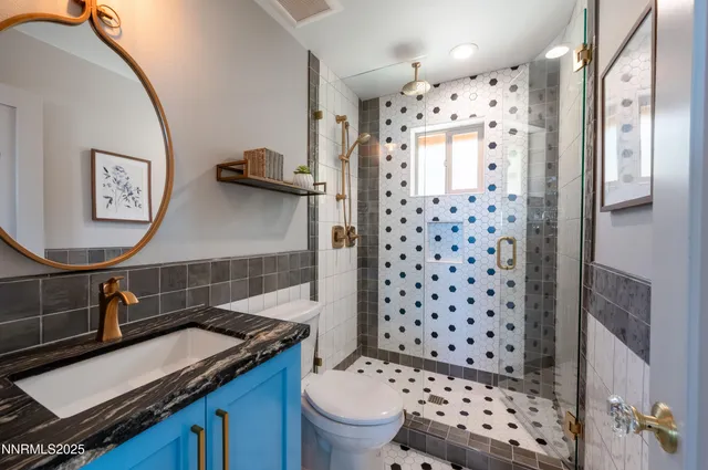 a kitchen with a stove a refrigerator and wooden cabinets