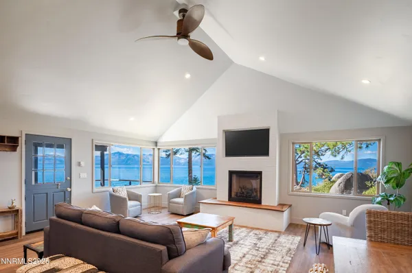 a bedroom with a bed and a fireplace