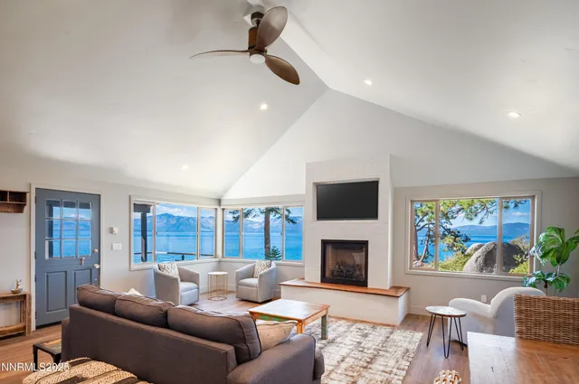 a bedroom with a bed and a fireplace