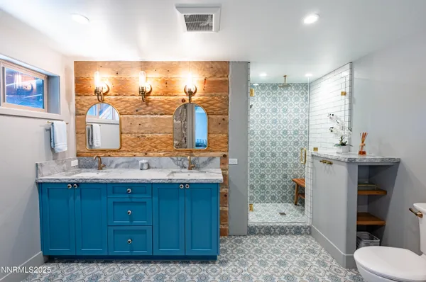 a kitchen with sink cabinets and wooden floor