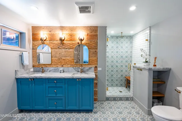 a kitchen with sink cabinets and wooden floor