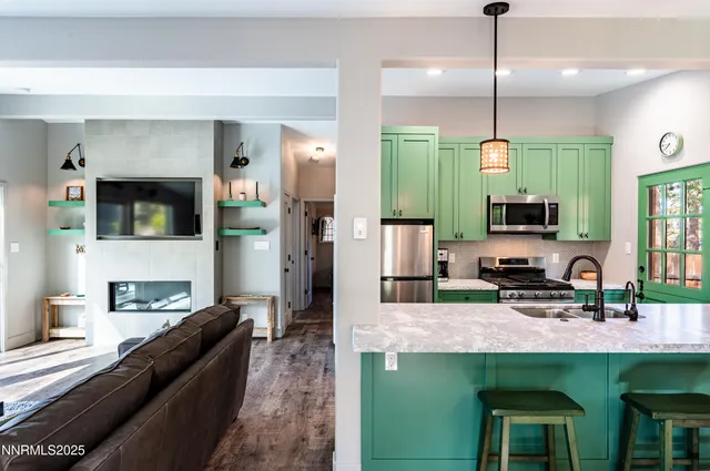 a view of a wooden house with a large trees