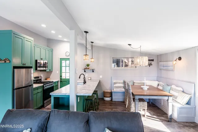 a living room with furniture or couch and a wooden floor