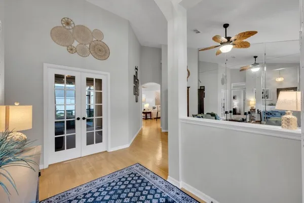 a kitchen with stainless steel appliances a refrigerator and a stove top oven