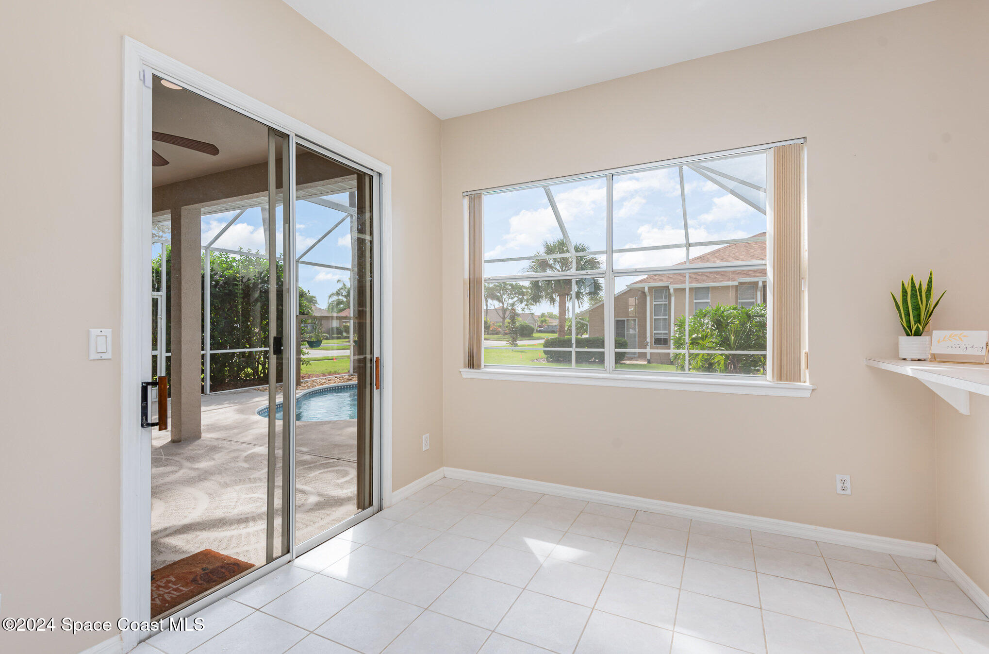 779 Thrasher Drive Rockledge, FL 32955 - Photo 13 of 35 a view of an empty room and window