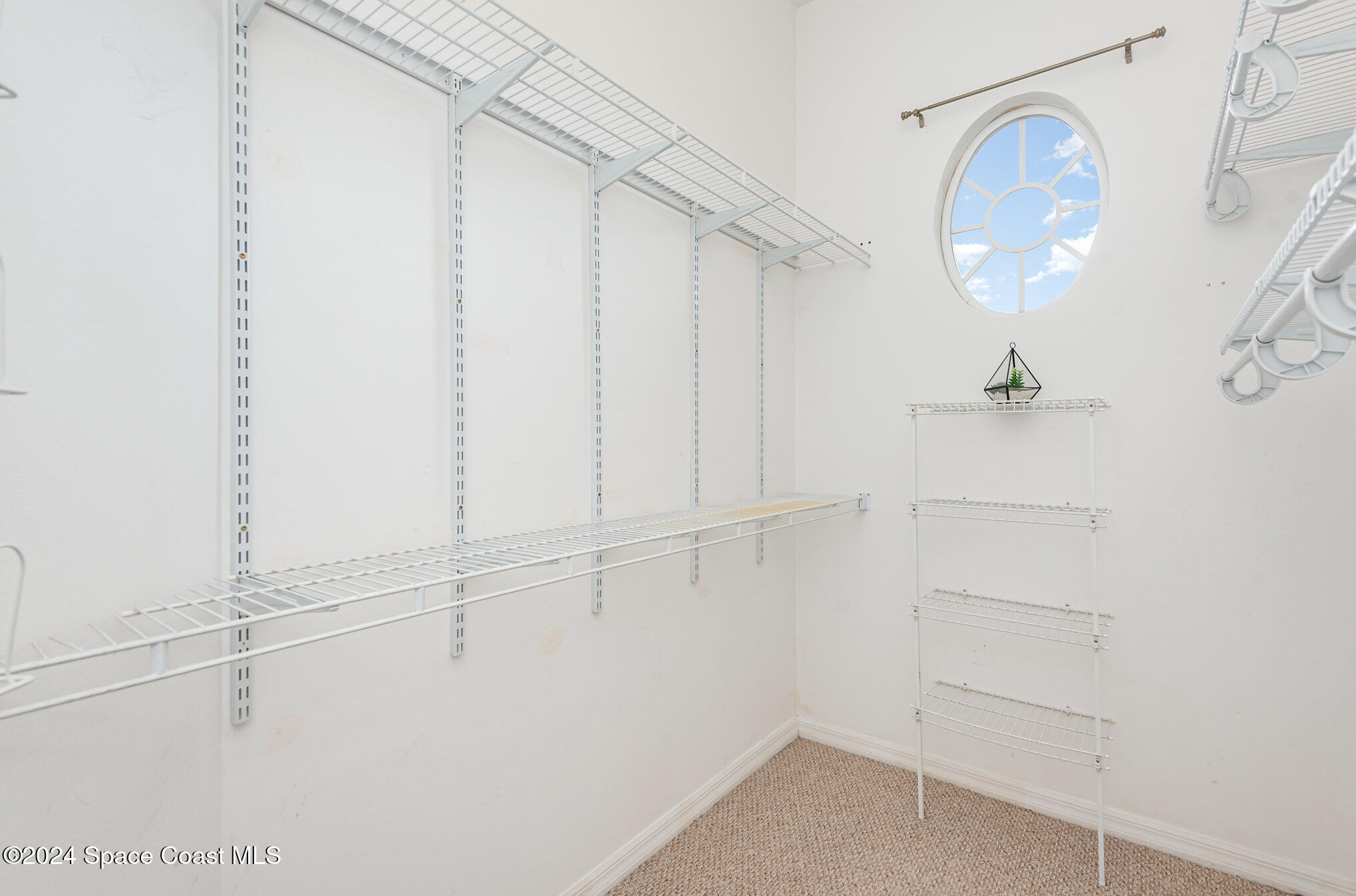 779 Thrasher Drive Rockledge, FL 32955 - Photo 19 of 35 a view of a decorative light in a hallway