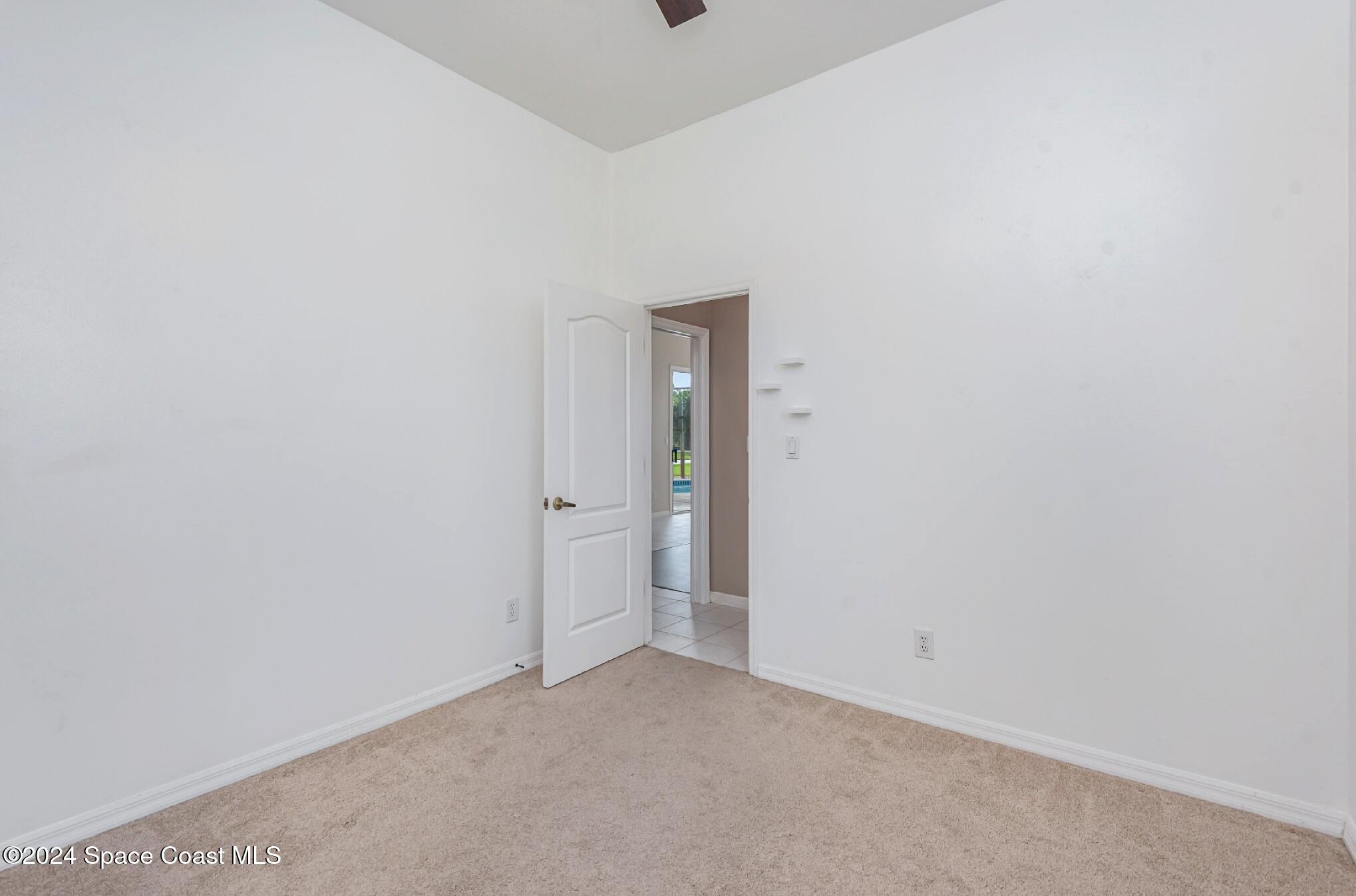 779 Thrasher Drive Rockledge, FL 32955 - Photo 23 of 35 a view of an empty room
