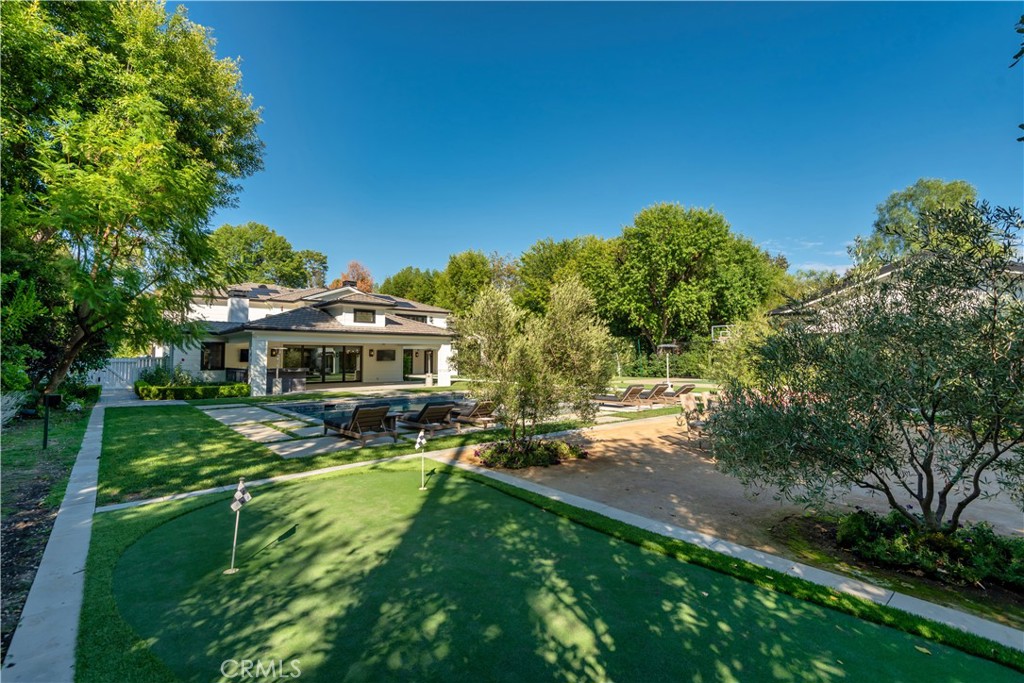 23924 Long Valley Road Hidden Hills, CA 91302 - Photo 32 of 39 a view of a house with a big yard
