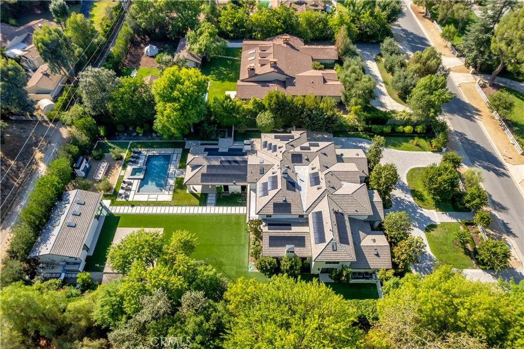 23924 Long Valley Road Hidden Hills, CA 91302 - Photo 34 of 39 an aerial view of a house with a garden and lake view