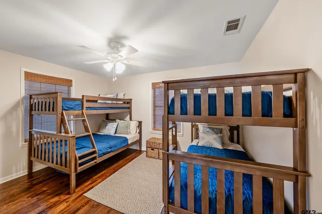 a bedroom with furniture and a window