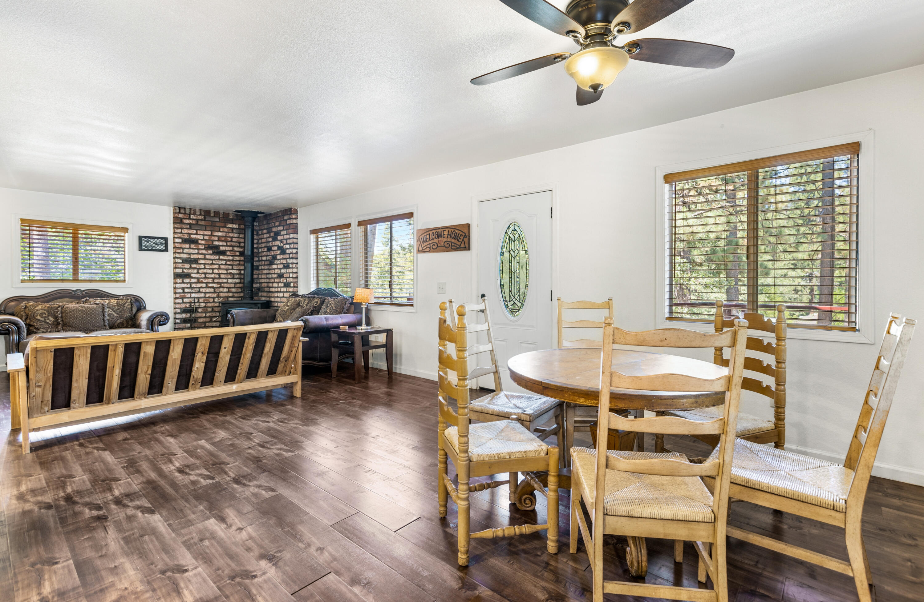 53589 Tollgate Road Idyllwild, CA 92549 - Photo 24 of 51 a view of a dining room with furniture window and wooden floor
