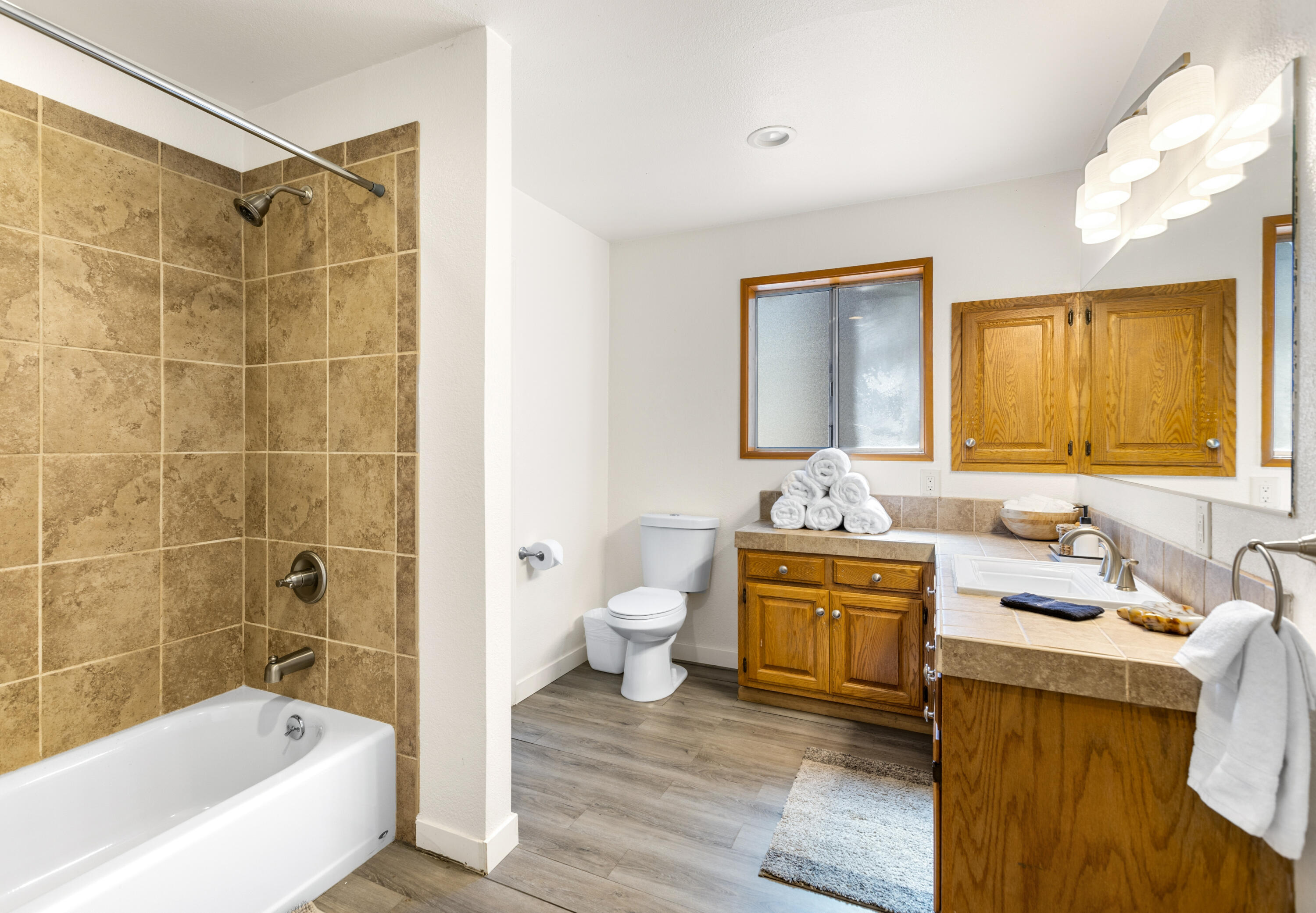 53589 Tollgate Road Idyllwild, CA 92549 - Photo 30 of 51 a bathroom with a tub sink toilet and mirror
