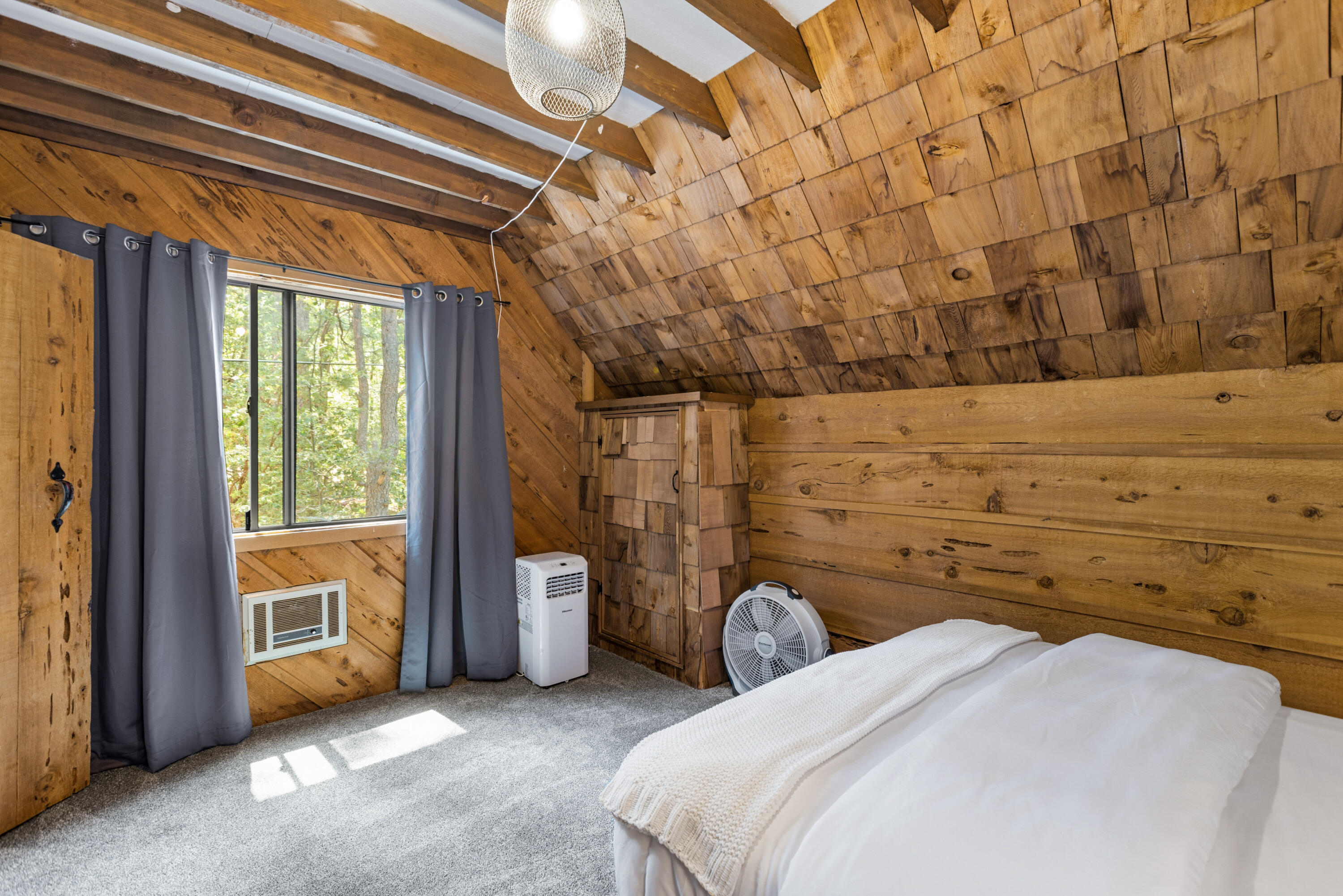 53589 Tollgate Road Idyllwild, CA 92549 - Photo 35 of 51 a bed room with a bed and a window