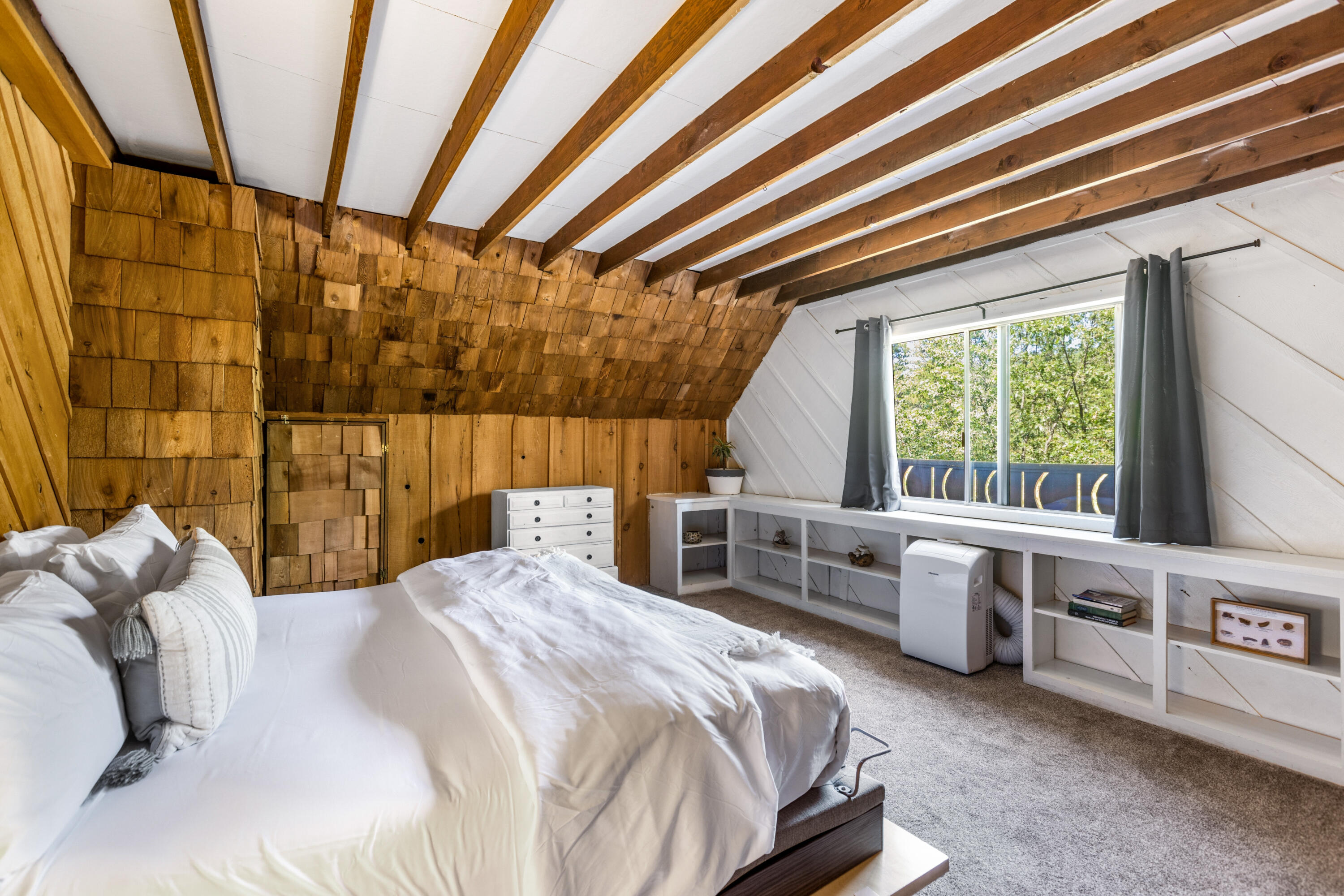 53589 Tollgate Road Idyllwild, CA 92549 - Photo 36 of 51 a bedroom with a bed and a large window