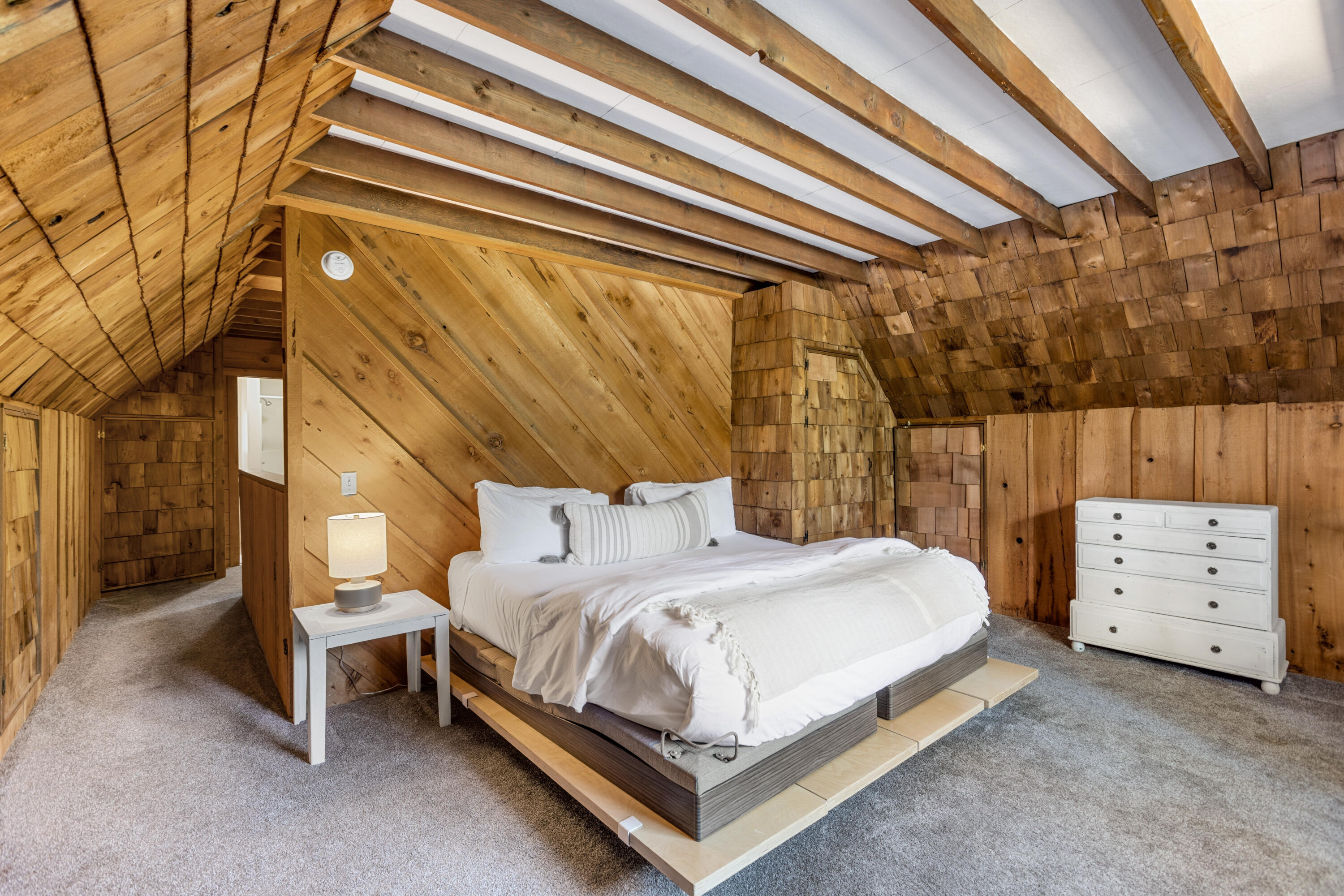 53589 Tollgate Road Idyllwild, CA 92549 - Photo 37 of 51 a bedroom with a bed and a night stand