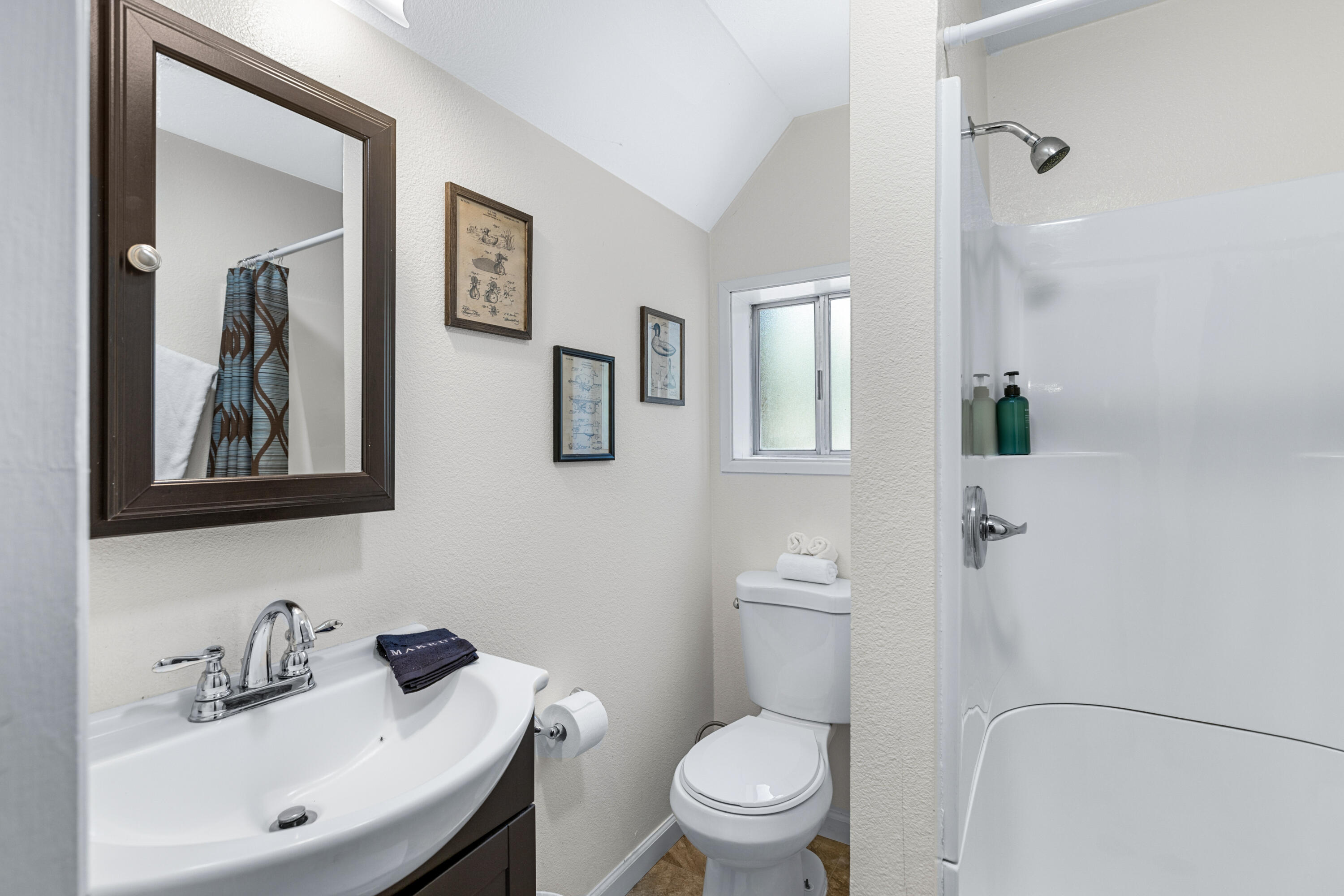 53589 Tollgate Road Idyllwild, CA 92549 - Photo 38 of 51 a bathroom with a toilet sink and mirror