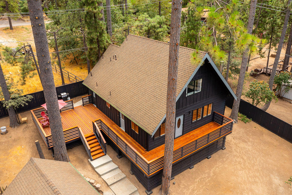 53589 Tollgate Road Idyllwild, CA 92549 - Photo 4 of 51 a backyard of a house with outdoor seating and trees