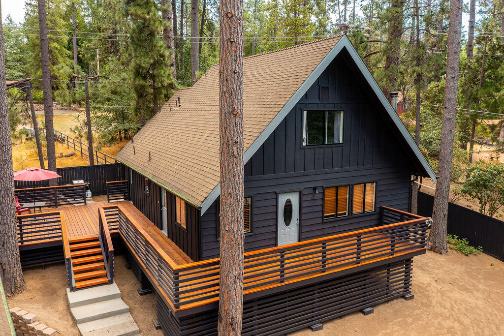53589 Tollgate Road Idyllwild, CA 92549 - Photo 45 of 51 a backyard of a house with wooden floor and outdoor seating