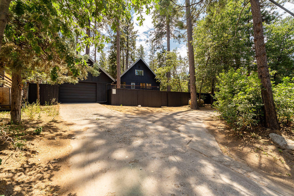 53589 Tollgate Road Idyllwild, CA 92549 - Photo 5 of 51 a front view of a house with a yard covered in snow