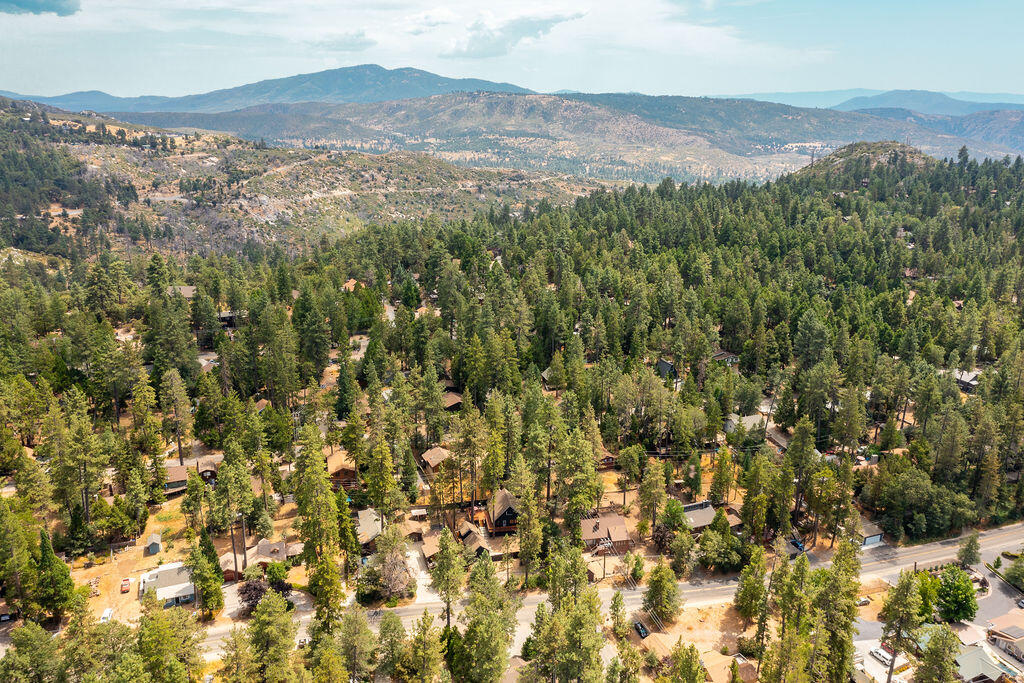 53589 Tollgate Road Idyllwild, CA 92549 - Photo 51 of 51 a view of a lush green hillside and a building