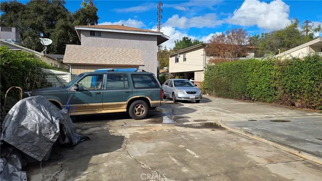a car parked in front of a house