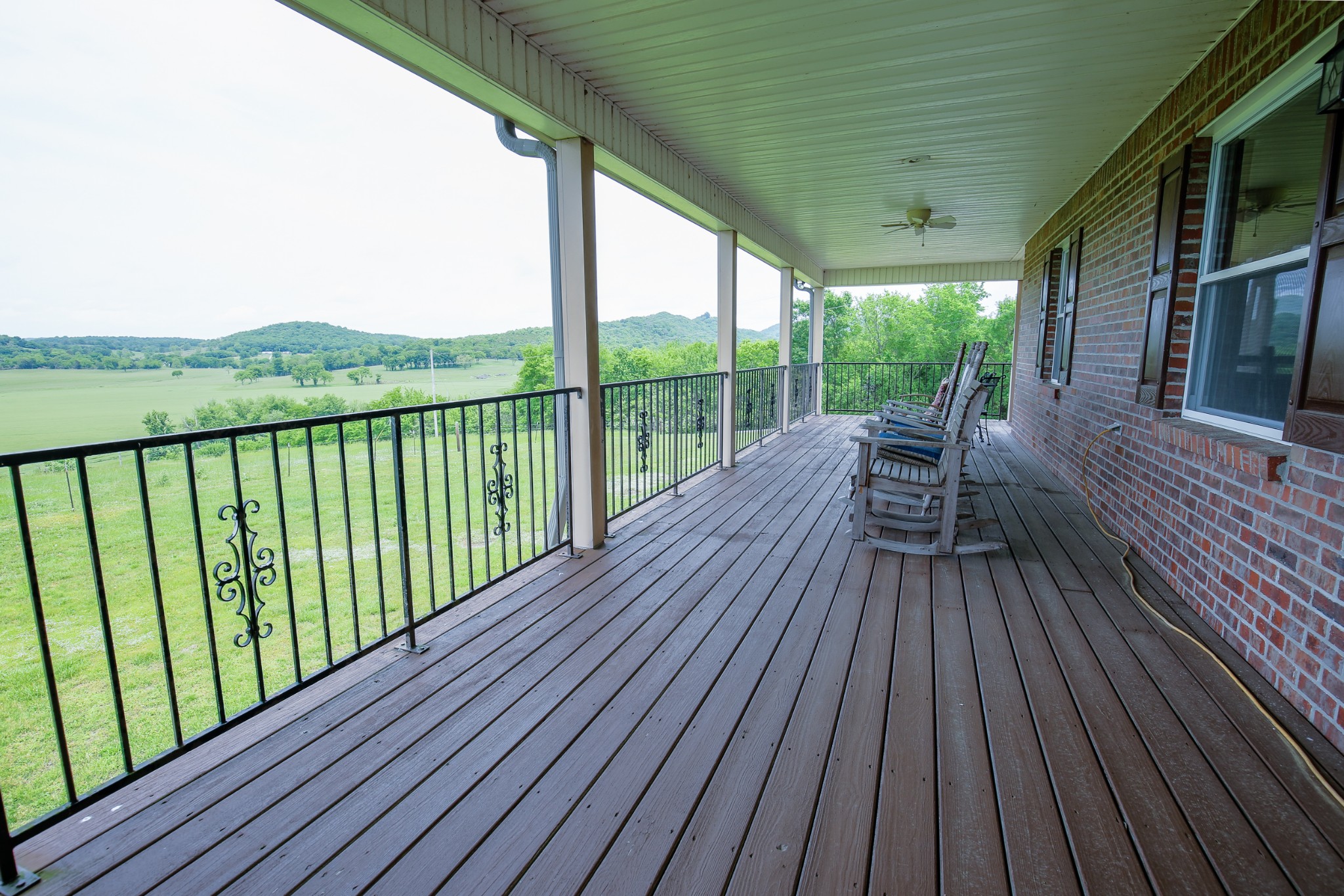 12 Camp Road Riddleton, TN 37151 - Photo 7 of 50 a view of balcony with deck and wooden floor
