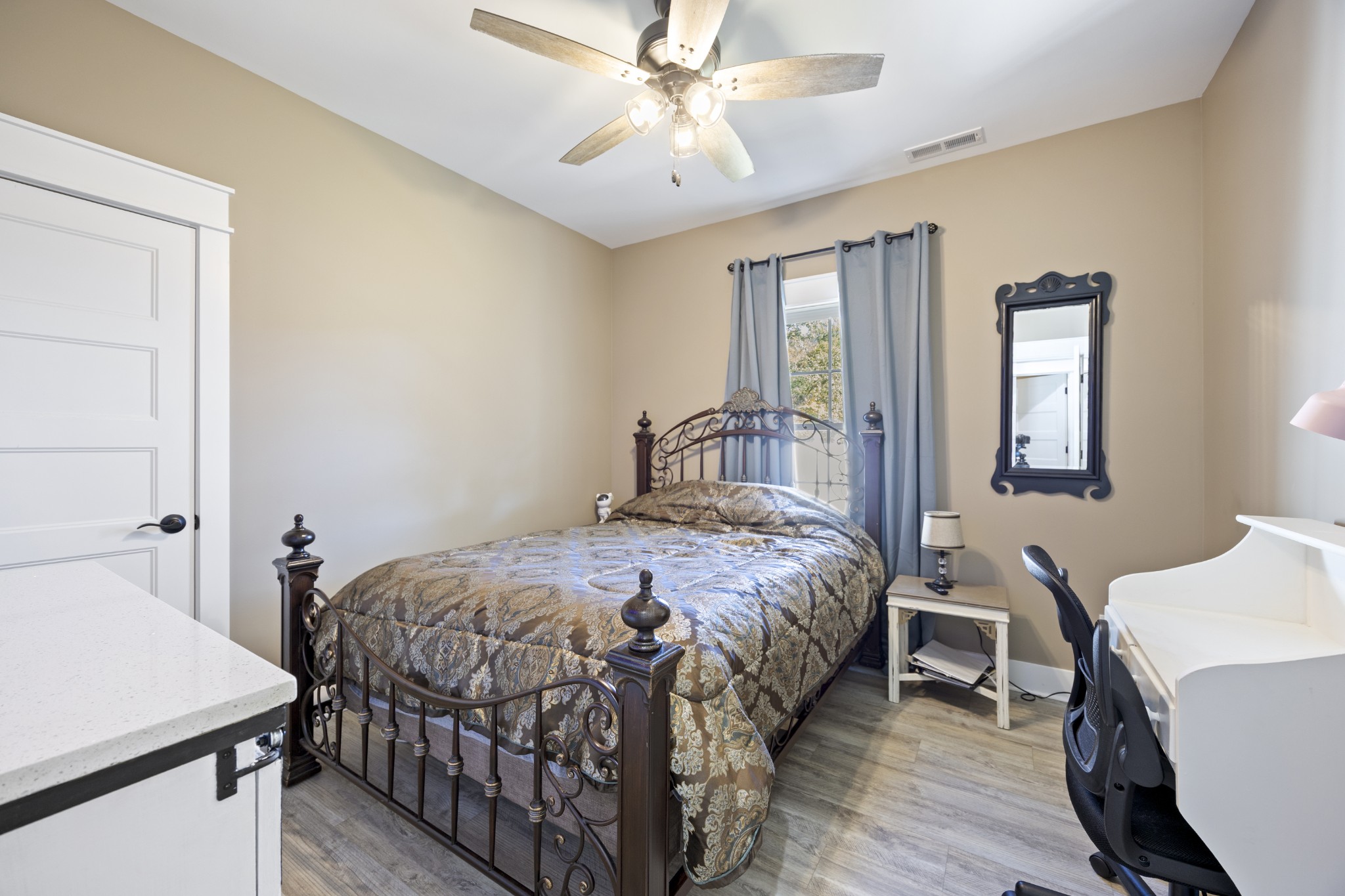 3575 Eastbrook Road Estill Springs, TN 37330 - Photo 13 of 36 a bedroom with a bed and a table