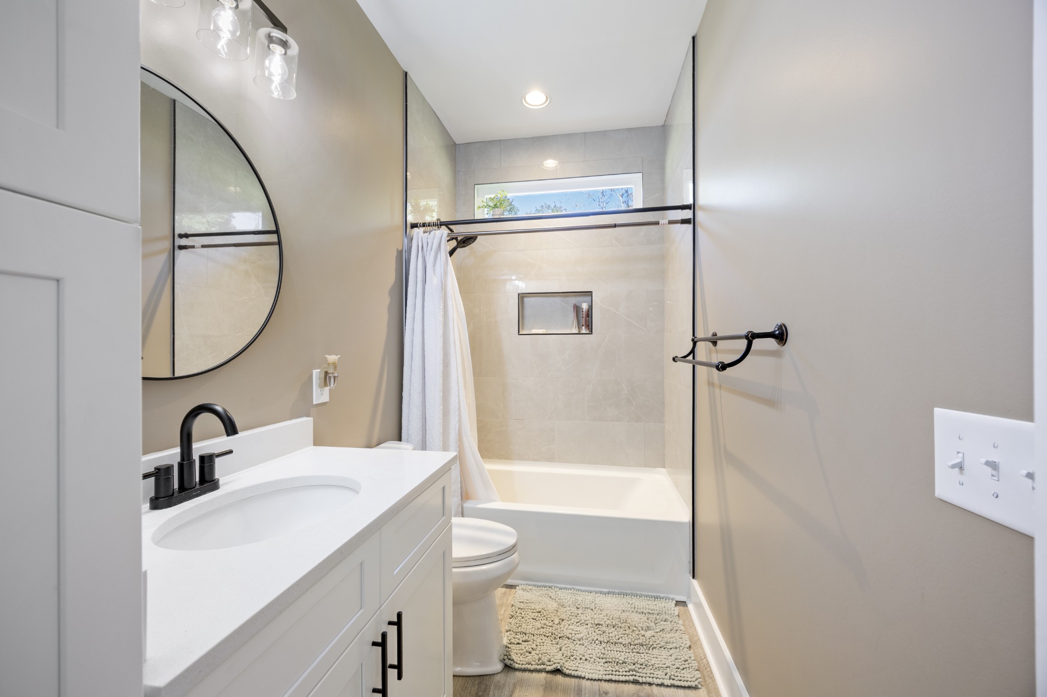 3575 Eastbrook Road Estill Springs, TN 37330 - Photo 15 of 36 a bathroom with a sink a toilet and a mirror