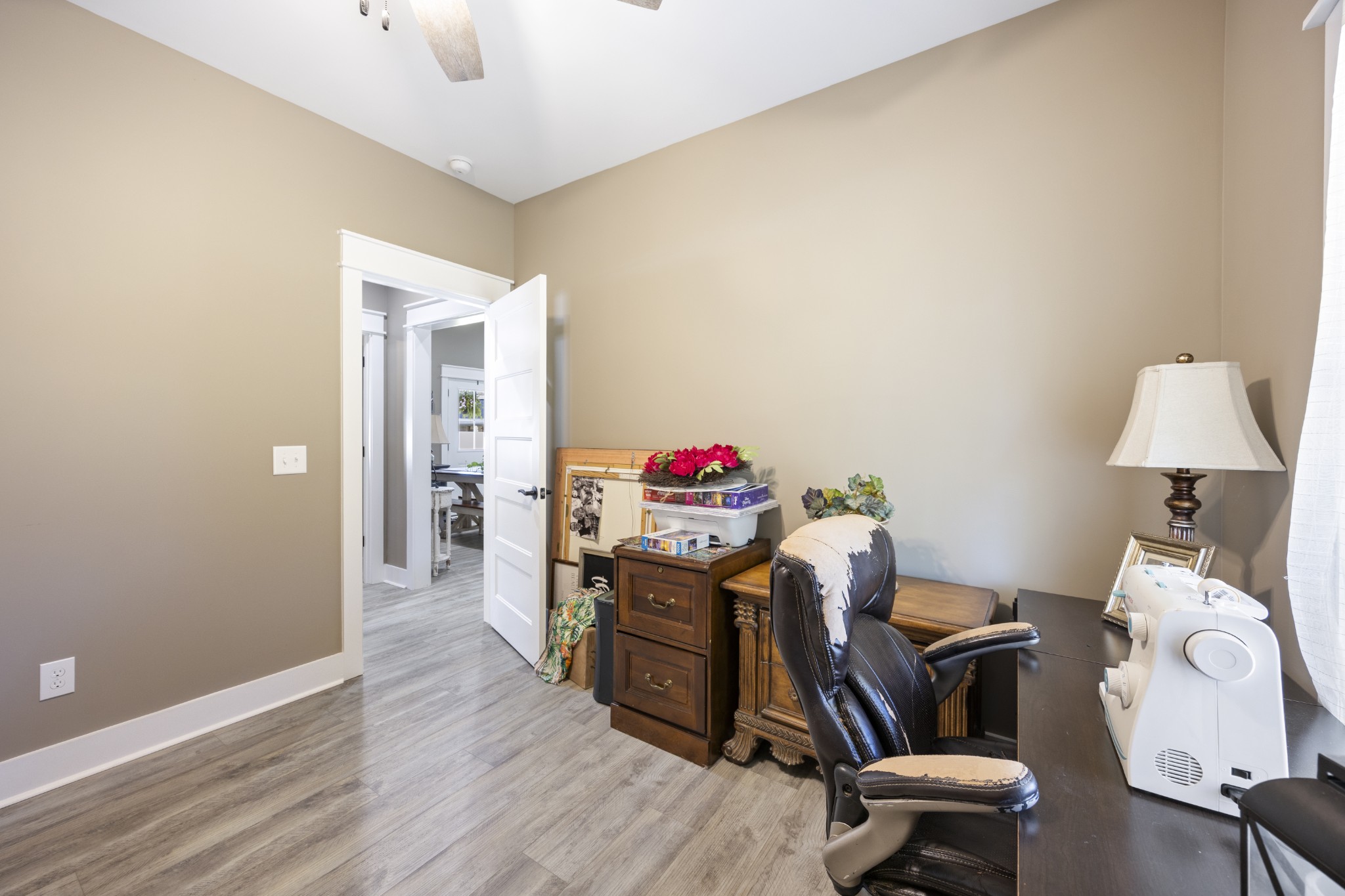 3575 Eastbrook Road Estill Springs, TN 37330 - Photo 18 of 36 a workspace with furniture and wooden floor