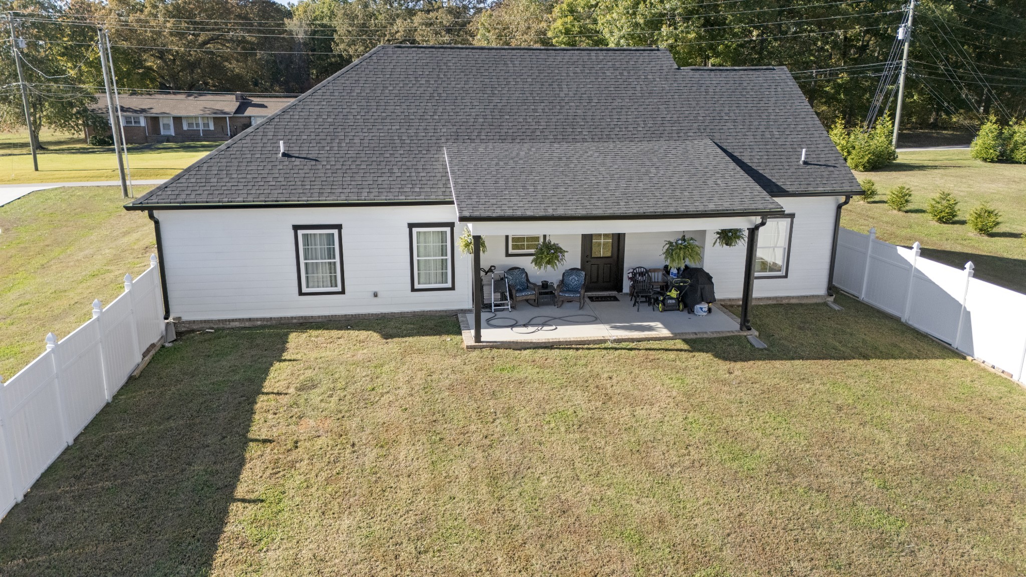 3575 Eastbrook Road Estill Springs, TN 37330 - Photo 31 of 36 an aerial view of a house with swimming pool and porch