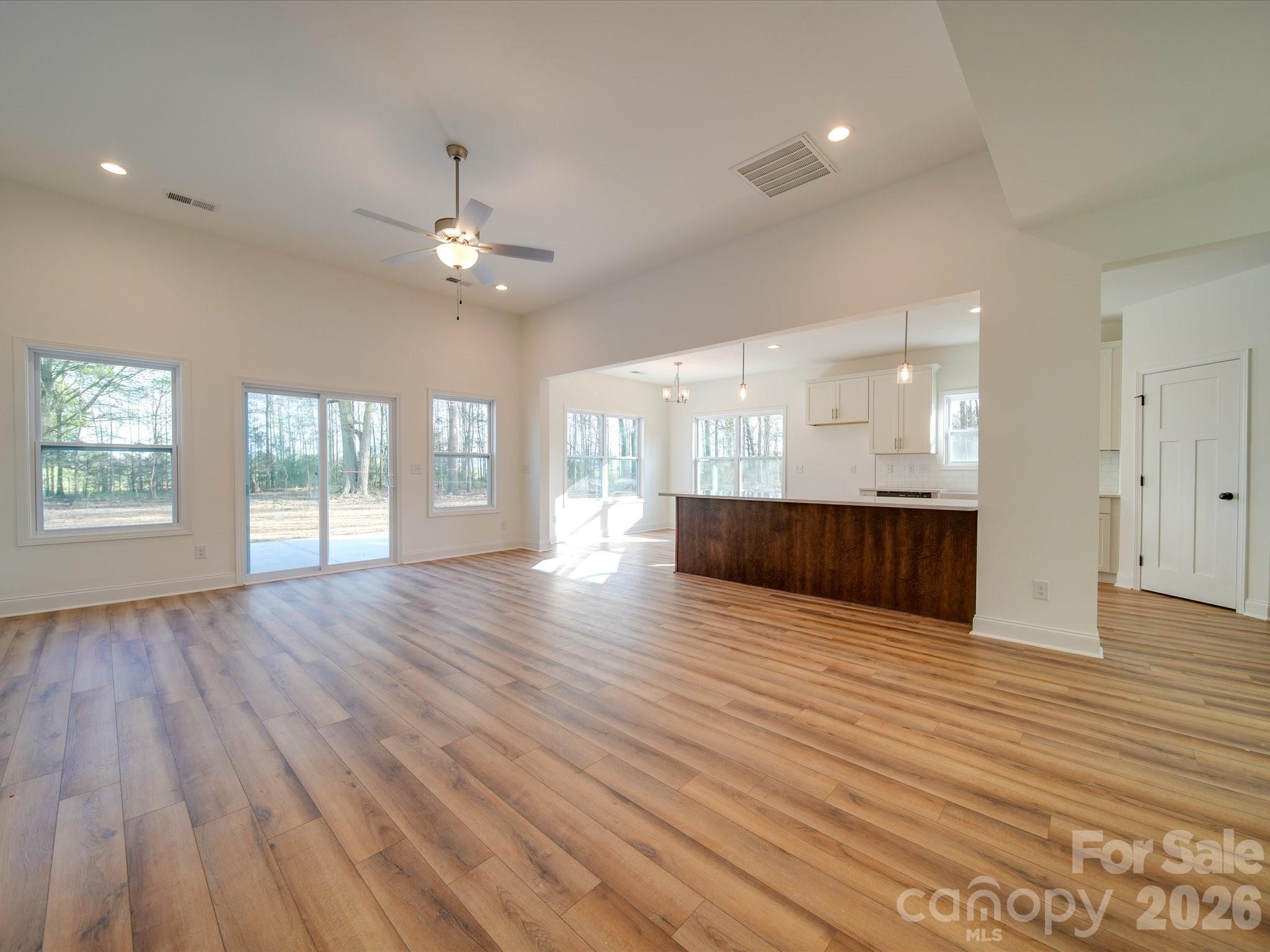 0 Hinson Road Monroe, NC 28112 - Photo 4 of 12 a view of an empty room with wooden floor and a window
