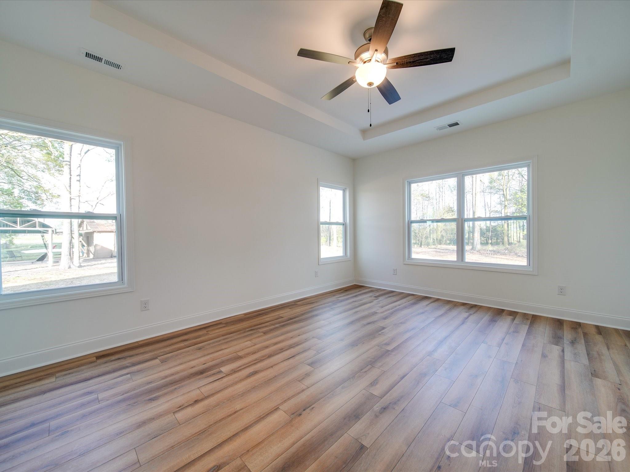 0 Hinson Road Monroe, NC 28112 - Photo 8 of 12 a view of an empty room with wooden floor and a window