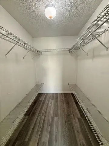 a view of a room with racks on the wall