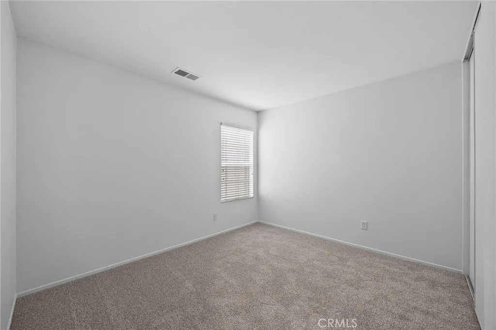 7353 Ellena West Street West, Unit 112 Rancho Cucamonga, CA 91730 - Photo 27 of 38 a view of room and window