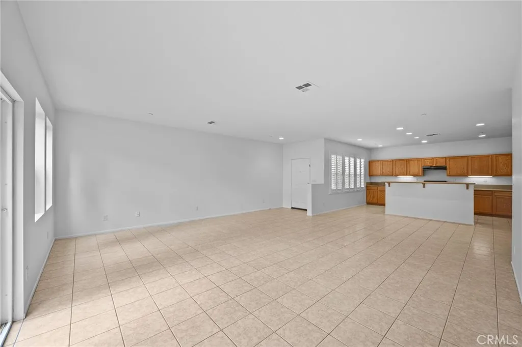 7353 Ellena West Street West, Unit 112 Rancho Cucamonga, CA 91730 - Photo 8 of 38 a view of a livingroom with a fireplace