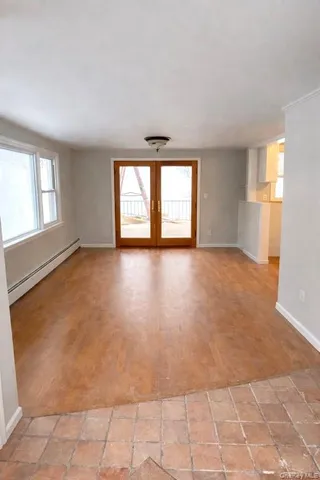 an empty room with windows