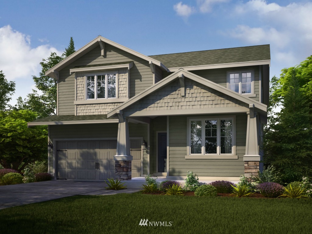 3232 170th Place Southeast, Unit 25 Bothell, WA 98012 - Photo 1 of 1 a front view of a house with a yard