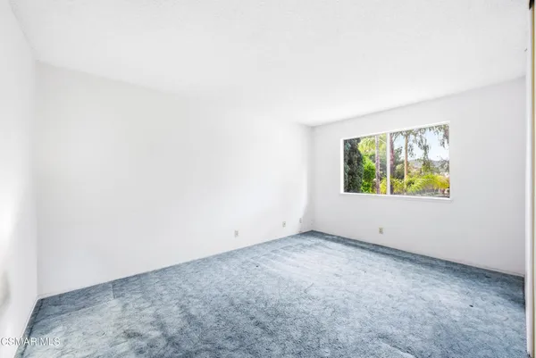 a view of an empty room with window