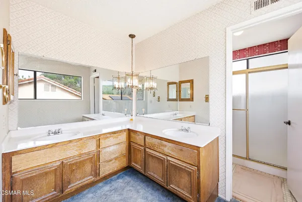 a bathroom with a bathtub and a toilet