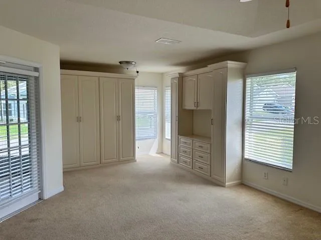 a bathroom with a sink vanity and a mirror