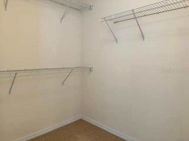 a bathroom with a sink vanity and a mirror