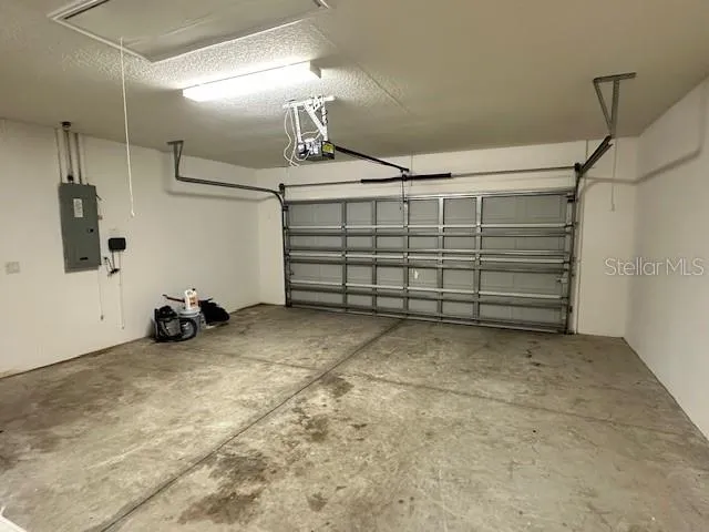 a view of a hallway with white walls
