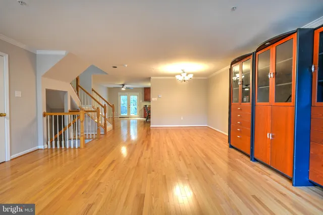 a bathroom with a sink a mirror and a lamp