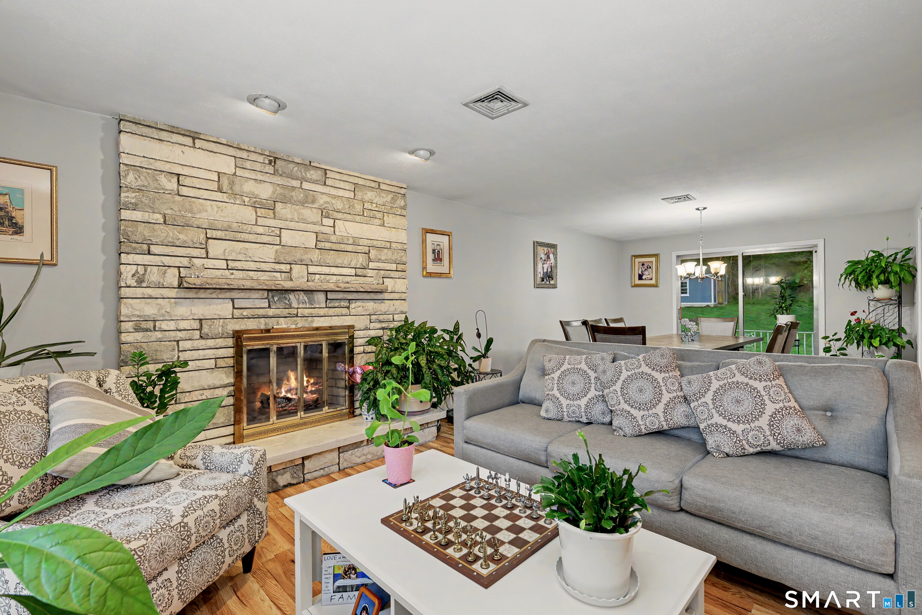 44 Haverhill Road Trumbull, CT 06611 - Photo 6 of 32 a living room with furniture fireplace and a fireplace