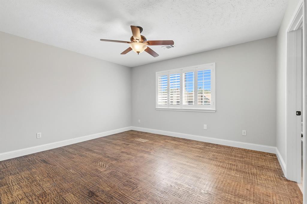 7632 Tallow Drive Irving, TX 75063 - Photo 28 of 40 Secondary Bedroom Upstairs