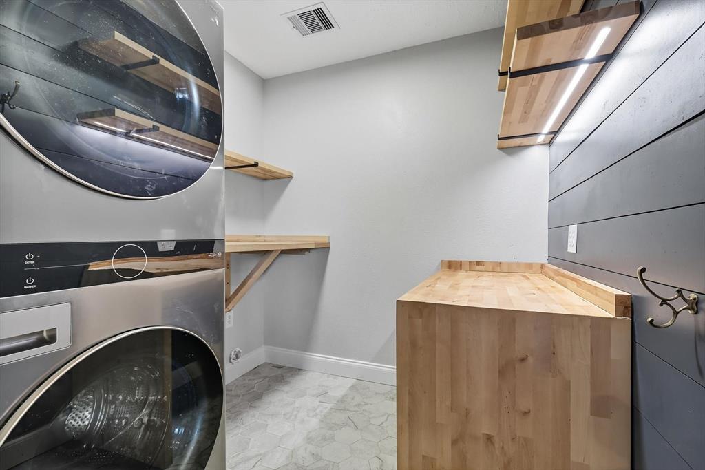 7632 Tallow Drive Irving, TX 75063 - Photo 30 of 40 Laundry room with built-in storage