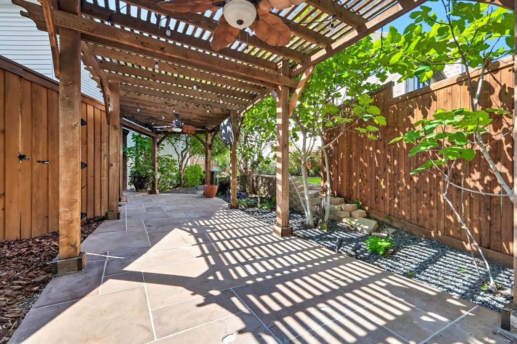 7632 Tallow Drive Irving, TX 75063 - Photo 37 of 40 Side pergola and patio off kitchen