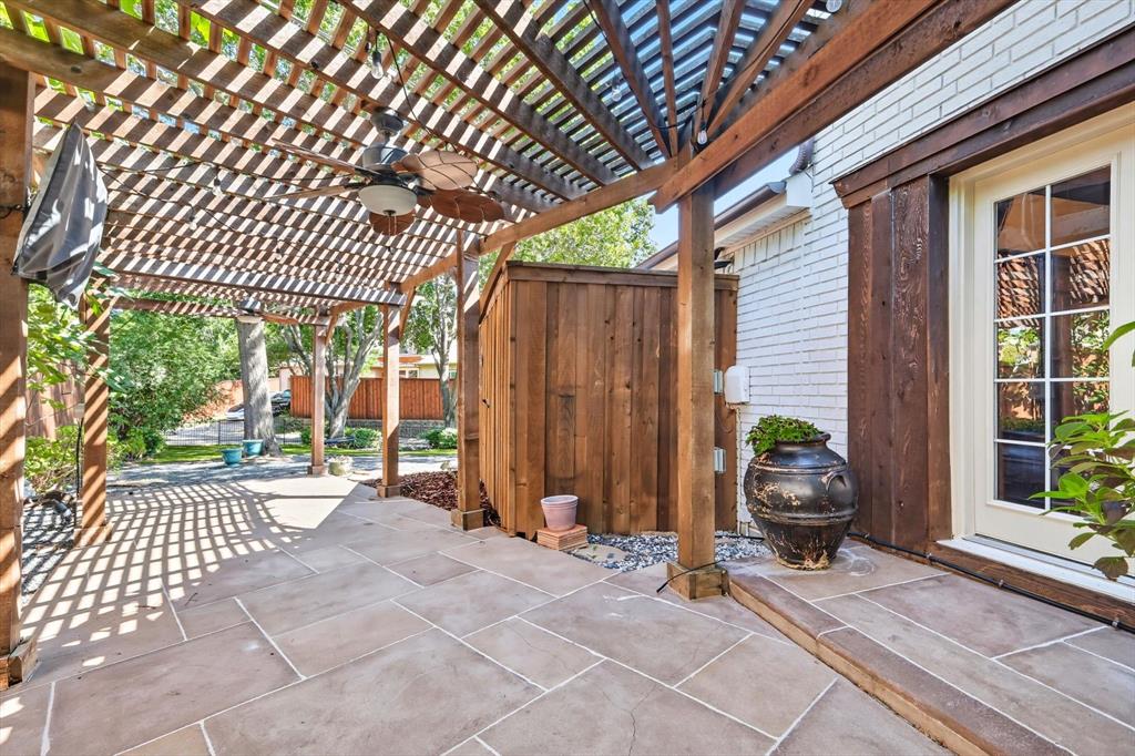 7632 Tallow Drive Irving, TX 75063 - Photo 38 of 40 Side pergola and patio off kitchen