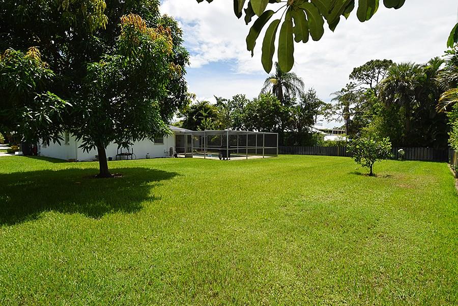 1975 Northwest Fork Road Stuart, FL 34994 - Photo 29 of 35 a view of a park with swings and slides