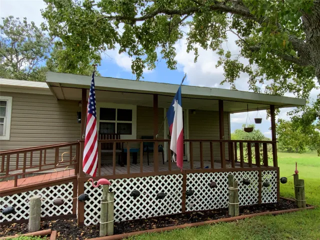 a view of a chairs setting on the deck